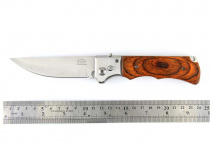 Нож скл. дерево A-563 с кнопкой